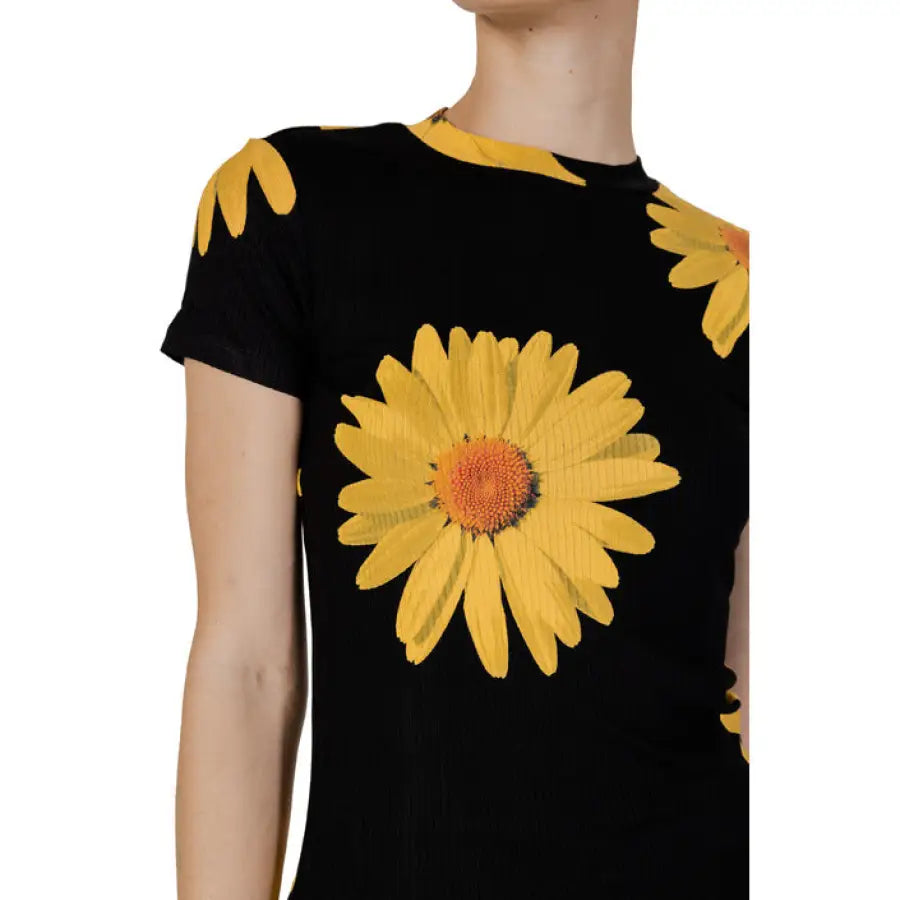 
                      
                        Desigual women t-shirt featuring a woman in black top with yellow flowers
                      
                    