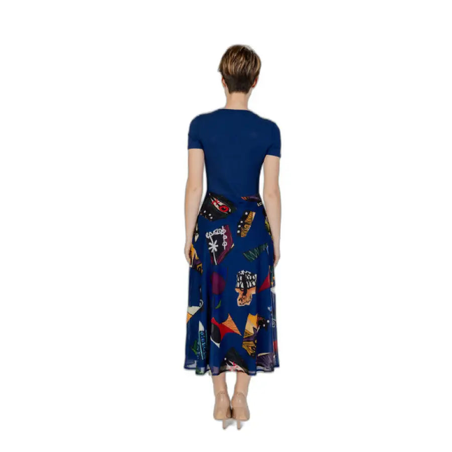 Urban style: Woman in a patterned blue Desigual dress - Desigual Women Dress