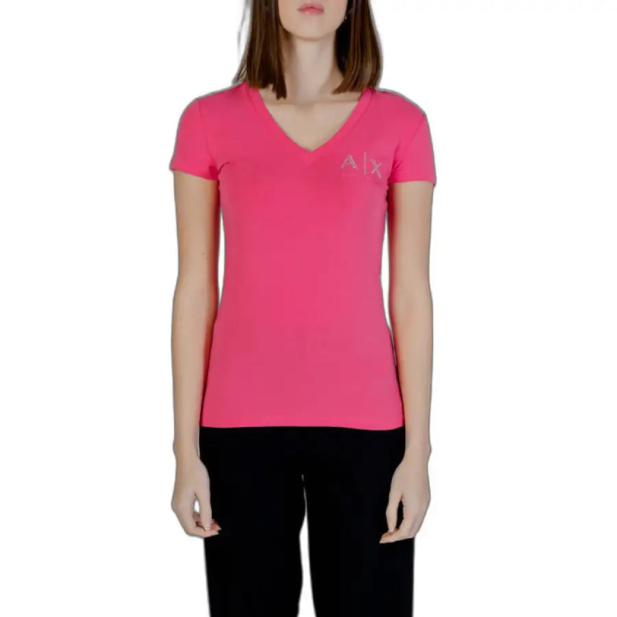 Woman in Armani Exchange pink V neck T-shirt
