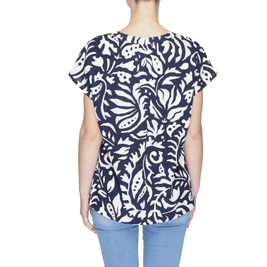 Urban style woman wearing white and black floral Street One women’s blouse