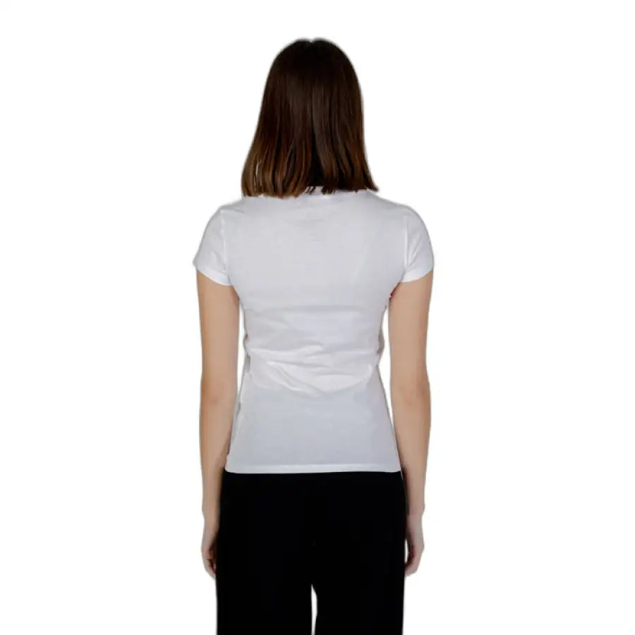 Woman in Armani Exchange white shirt standing - Armani Exchange Women T-Shirt