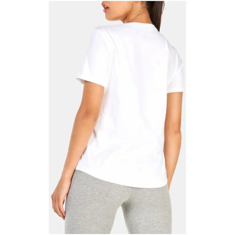 Woman wearing Nike Women White Printed Cotton Round Neck T Shirt and grey leggings