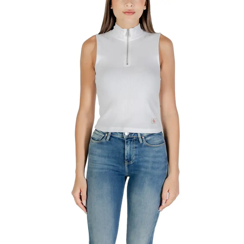 Woman wearing Calvin Klein Jeans white sleeveless zip turtleneck top and blue jeans