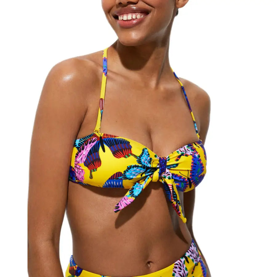 Urban style clothing: Woman in a yellow bikini top & blue shorts - Desigual Women Beachwear