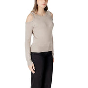 Woman wearing beige cold-shoulder sweater from Women Cold Shoulder Sweater Collection