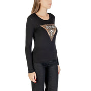 Woman wearing Guess black long-sleeve round neck T-shirt with leopard print Guess logo