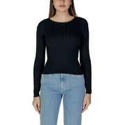 Woman’s black ribbed long-sleeve top paired with Vila Clothes Beige Knit Sweater