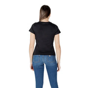 Woman wearing Guess Active black round neck rhinestone T-shirt with blue jeans