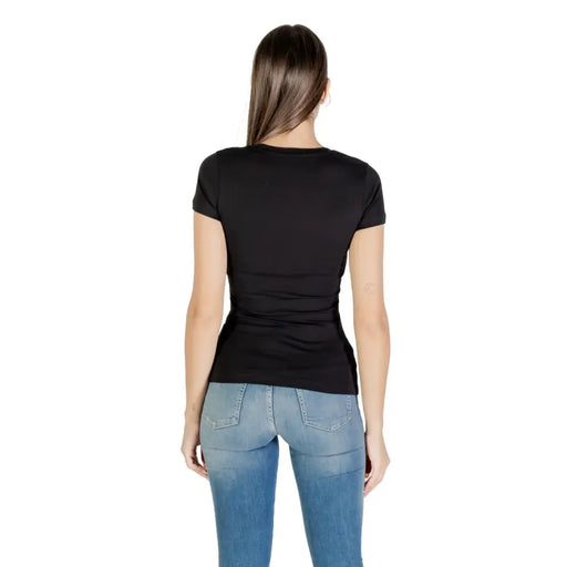 Black women’s short-sleeved rhinestone print round neck T shirt paired with blue jeans