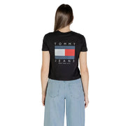 Woman wearing Tommy Hilfiger black organic cotton T-shirt with rectangular logo on back