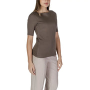 Street One Women Brown Round Neck Slip On T Shirt paired with light beige pants