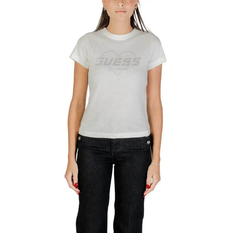 Woman wearing Guess Active white short-sleeved T-shirt with GUESS logo inside heart design