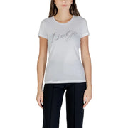 Woman wearing a white Liu Jo short-sleeved T-shirt with silver rhinestone logo