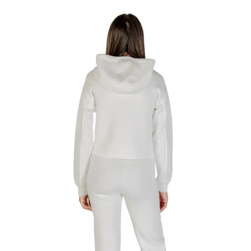 Full light gray women’s tracksuit with hooded sweatshirt and matching pants displayed