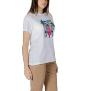 Woman wearing a white graphic T-shirt featuring a scooter illustration
