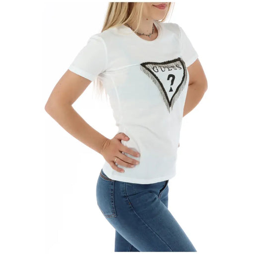 Woman wearing Guess white round neck short sleeve cotton T shirt with black triangular logo