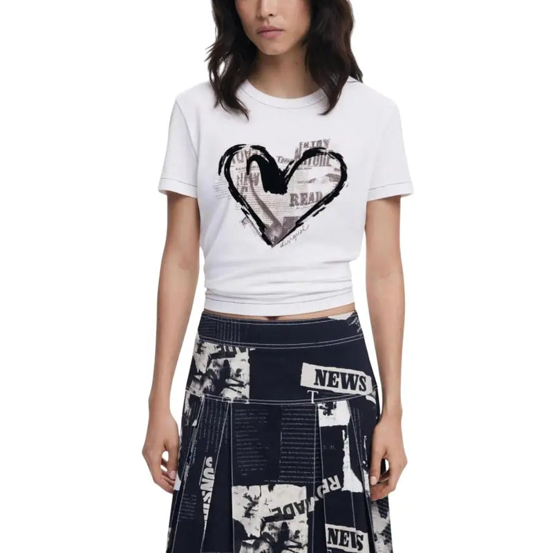 Woman wearing Desigual black print short sleeve round neck T-shirt with navy newspaper print skirt