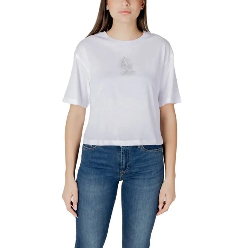 Woman wearing a white T shirt and blue jeans in the Womens White T Shirt and Blue Jeans product image