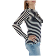 Women striped long sleeve shirt with black and white stripes and black lace heart design on the chest
