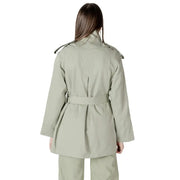A sleek olive green women’s belted trench coat blazer with structured shoulder epaulets and matching belt