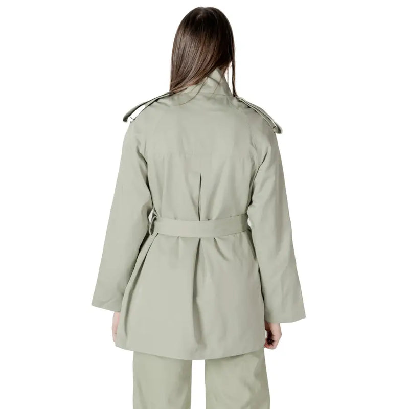 A sleek olive green women’s belted trench coat blazer with structured shoulder epaulets and matching belt