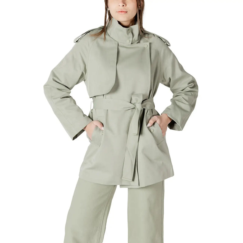 A sleek olive-green women’s belted trench coat blazer with structured shoulders and a fitted waist design
