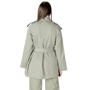 A sleek olive green women’s belted trench coat blazer with structured shoulder epaulets and matching belt