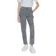 Women’s black geometric trousers with lace detail featuring high-waisted black and white houndstooth drawstring trousers