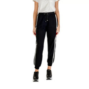 Women’s black cotton blend joggers with white side stripes and lace details