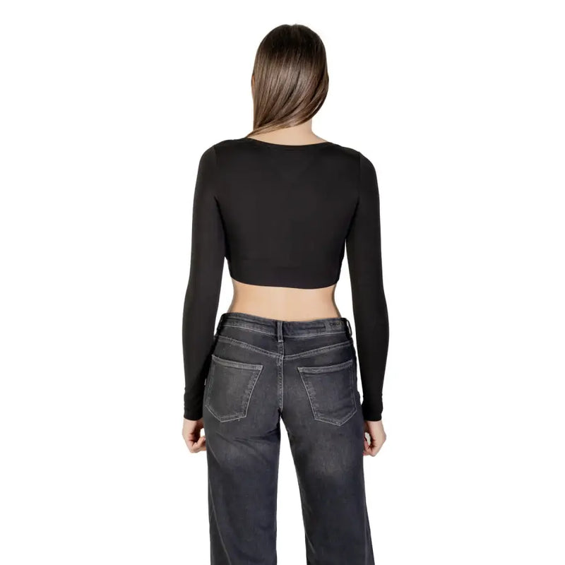 Women’s black long-sleeve crop top from Tommy Hilfiger Jeans featuring a printed design