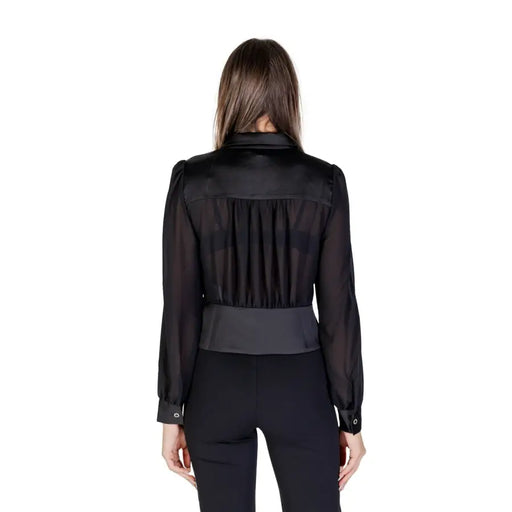 Women’s black long-sleeved sheer blouse with pintuck detailing and a wide waistband