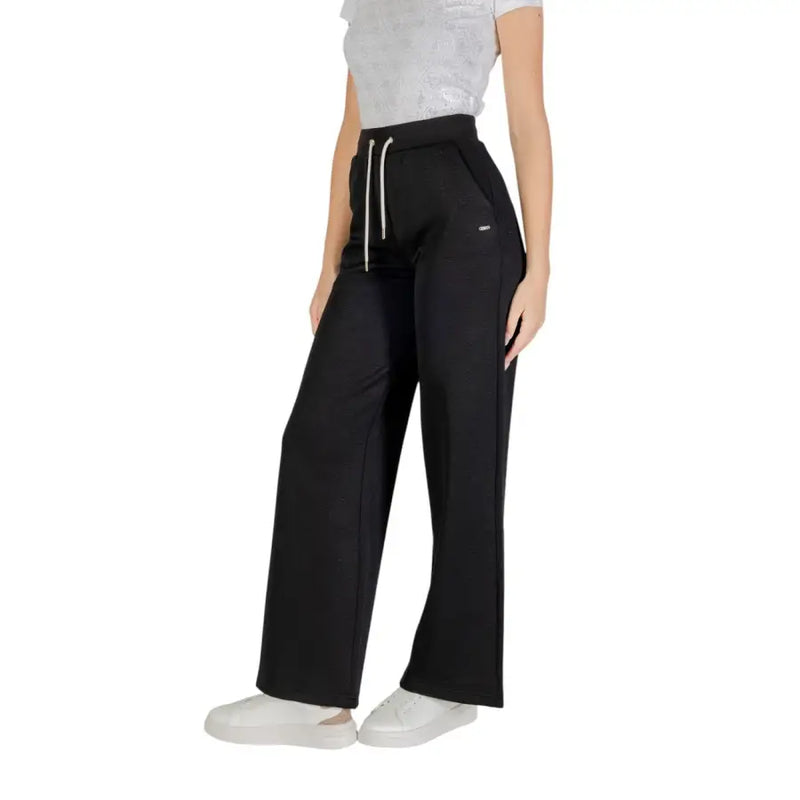 Women’s black wide-leg sweatpants with white drawstring from Guess Active collection