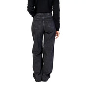 Women’s black wide leg jeans in dark-wash denim with a relaxed fit and classic back pockets shown from the back view