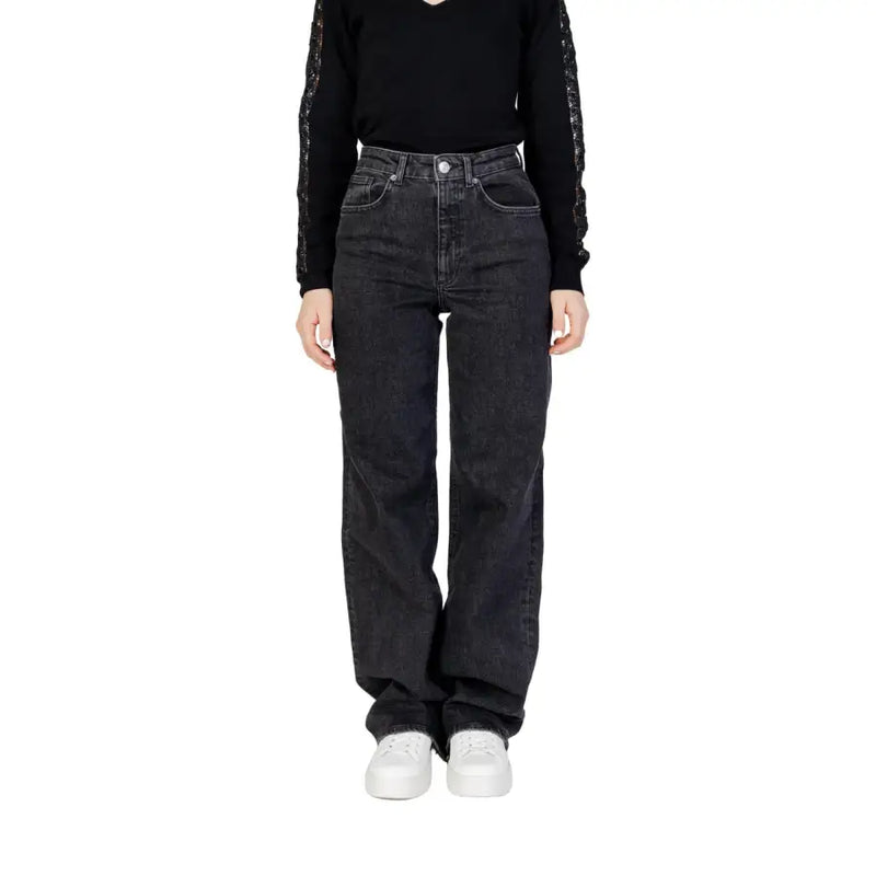Women’s black wide leg jeans high-waisted dark wash denim with a straight-leg cut shown from the front