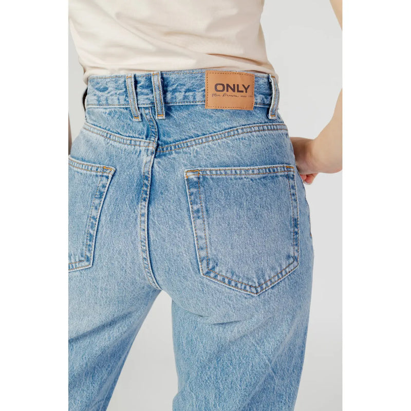 Women’s blue light-wash denim jeans with high-rise waist and back pockets featuring only brand leather patch at hip viewed from back