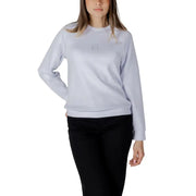 Women’s light blue sweatshirt featuring a light gray Armani Exchange fabric with a subtle embroidered chest logo