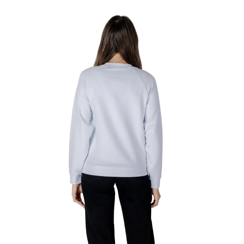 Women’s light blue sweatshirt in soft light gray fabric with long sleeves crew neck and ribbed cuffs
