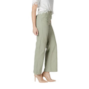 Women’s light green wide leg pants with olive green fabric and subtle side seam detail featuring a tailored fit