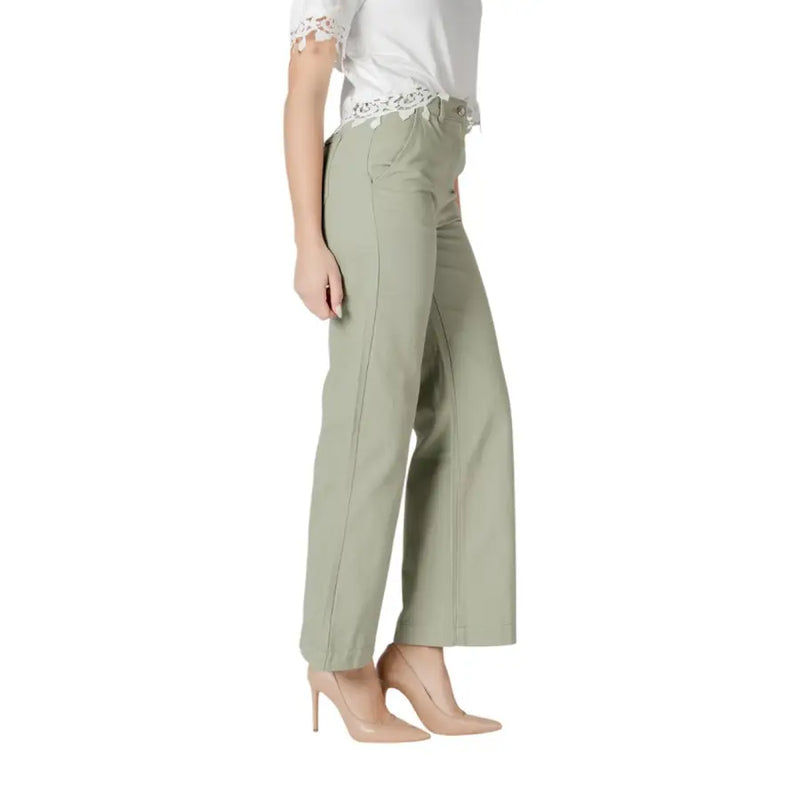 Women’s light green wide leg pants with olive green fabric and subtle side seam detail featuring a tailored fit