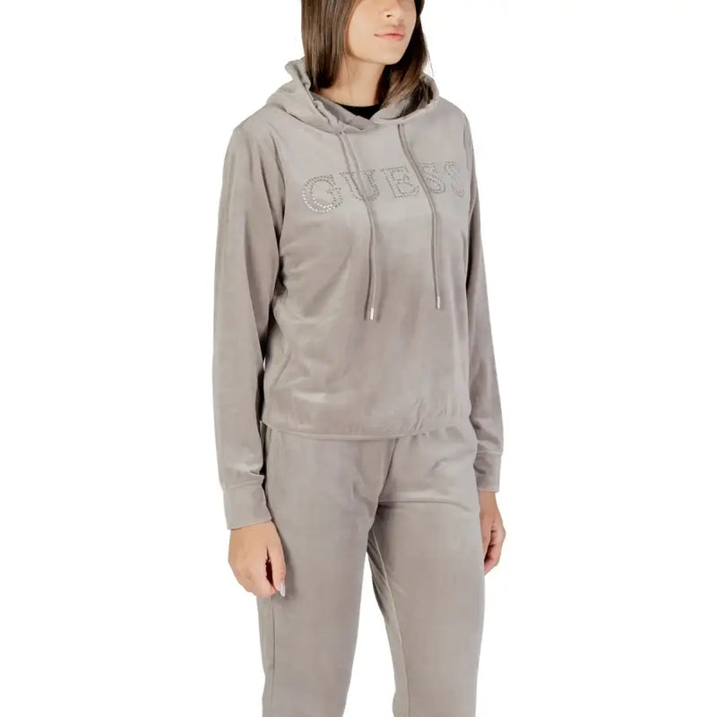Women’s light grey velour tracksuit with hooded sweatshirt and drawstring pants for active wear