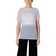 Women’s sheer white mesh top with subtle patterned lower section and short sleeves paired with white tank