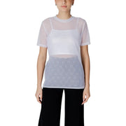 Women’s sheer white mesh top with subtle patterned lower section and short sleeves paired with white tank