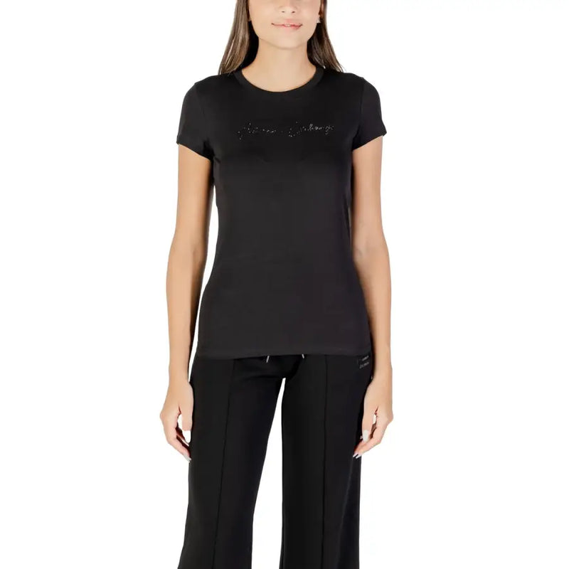 Women wearing Armani Exchange short-sleeve black rhinestone cotton T-shirt with matching wide-leg sweatpants