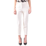 Women’s white cropped trousers with black pointed-toe heels from Pinko Spring Summer collection