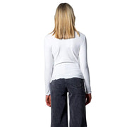Women’s white long sleeve round neck t-shirt with ribbed texture and slightly flared hem in soft fabric
