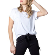 Women’s white short sleeve viscose blend t-shirt with loose fit and slightly rolled-up sleeves