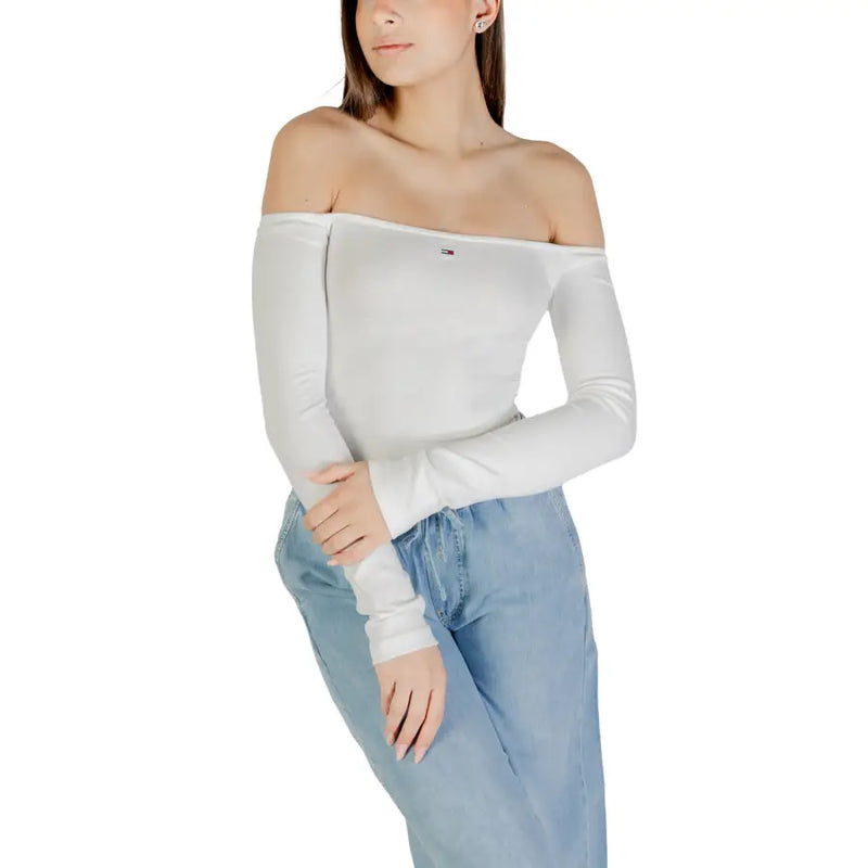 Womens white off the shoulder long sleeve top featuring a subtle Tommy Hilfiger logo on the chest