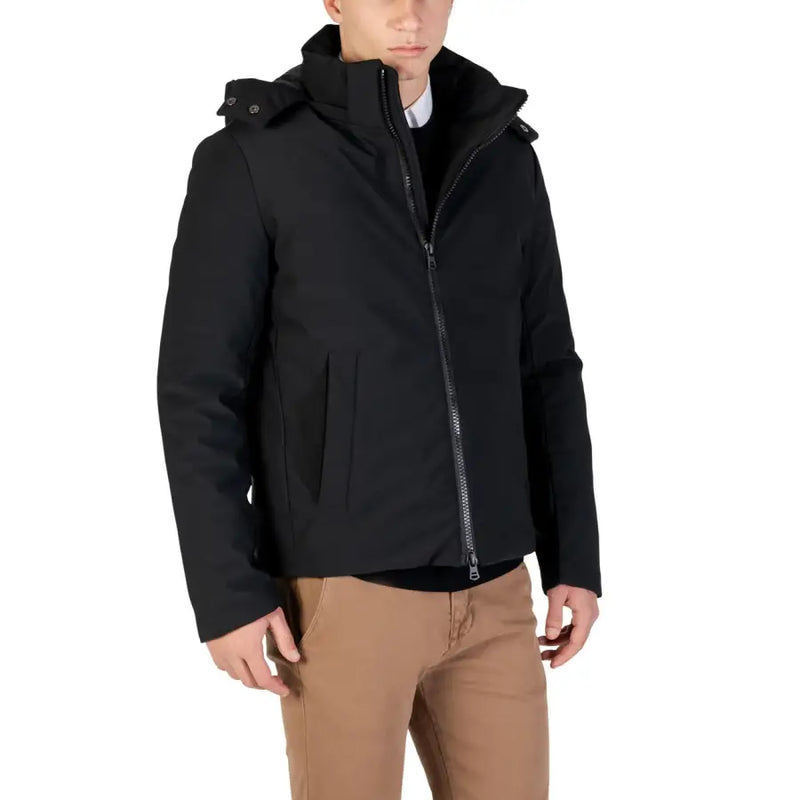 Black zip-up jacket with hood and pockets, likely made of nylon or polyester material.