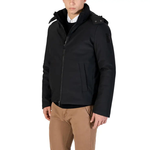 Black down jacket with hood and shearling lining, popular brand: canada goose.