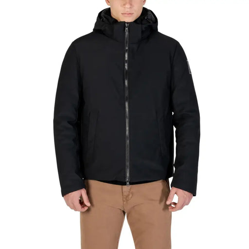 Black waterproof jacket with hood and zipper, possibly by columbia or patagonia.